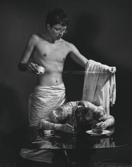 Free Stock Photo of Topless Male with Tape - Woman on Table
