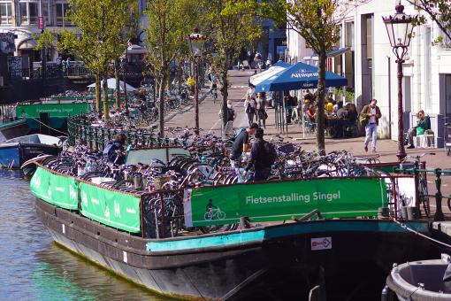 Free Stock Photo of Bicycle Parking Space on Water