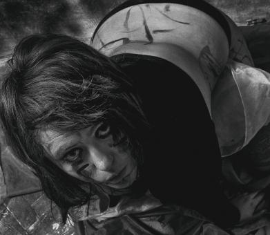 Free Stock Photo of Painted Kneeling Girl Portrait - Monochrome