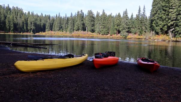 Free Stock Photo of 3 Kayaks on Beach