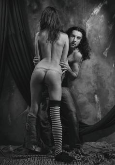Free Stock Photo of Man Posing Behind a Topless Woman - Monochrome