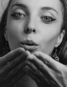 Free Stock Photo of Girl Blowing Kisses - Monochrome