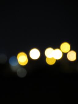 Free Stock Photo of Yellow Bokeh on Black