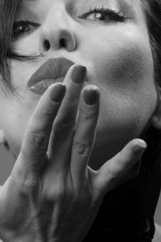 Free Stock Photo of Female Portrait - Blowing a Kiss