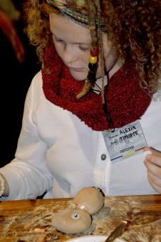 Free Stock Photo of THE GIRL WITH CURLY HAIR CREATE WITH ECO MATERIAL IN THE WORKSHOP.