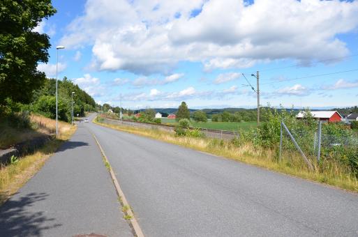 Free Stock Photo of Two kinds of kinds of traffic,  a road for cars and norwegian railways