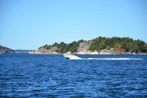 Free Stock Photo of A speedboat is on the water of fjord in Norway