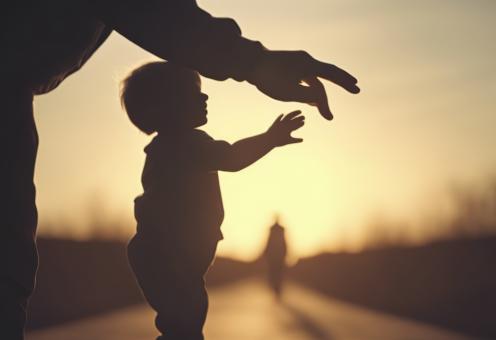 Free Stock Photo of Silhouette of Father Holding His Son's Hand