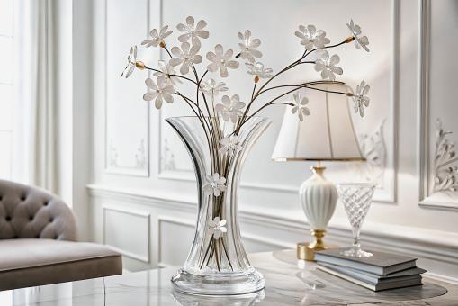 Free Stock Photo of Elegant Crystal Vase with Delicate White Flower Accents 