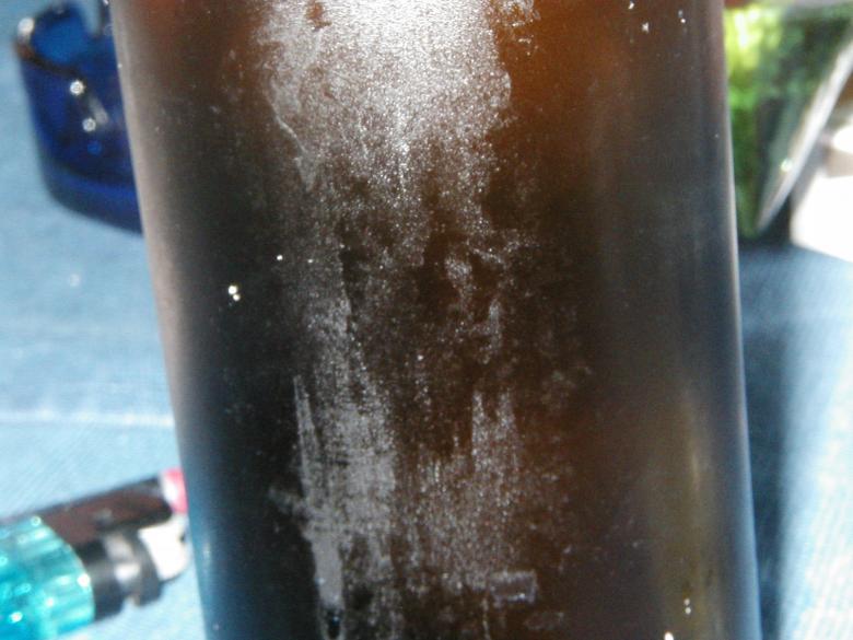 Free stock image of Beer bottle closeup created by damien van holten