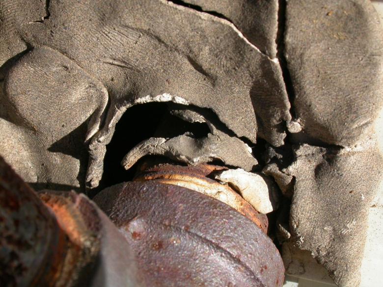 Free stock image of Rusted pipe in broken wall created by raymond henry
