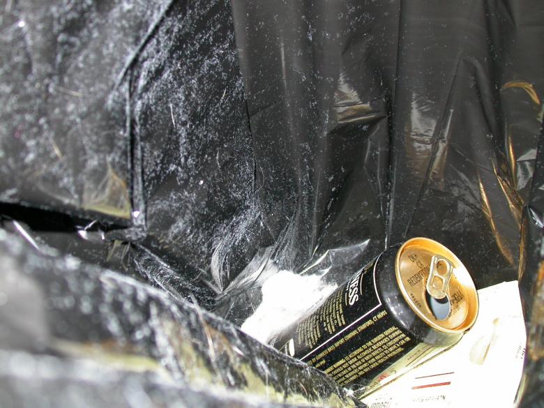 Free stock image of Beer can in plastic bag created by raymond henry