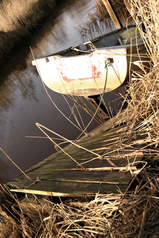 Free stock image of Old boat and dry grass created by Bjorgvin