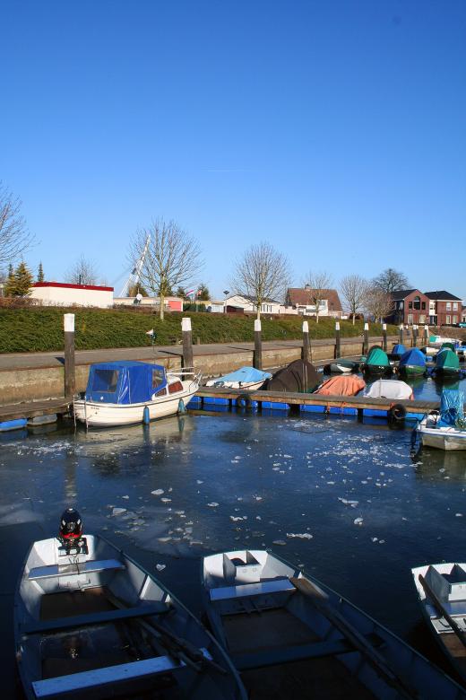 Free stock image of Frozen harbor created by damien van holten