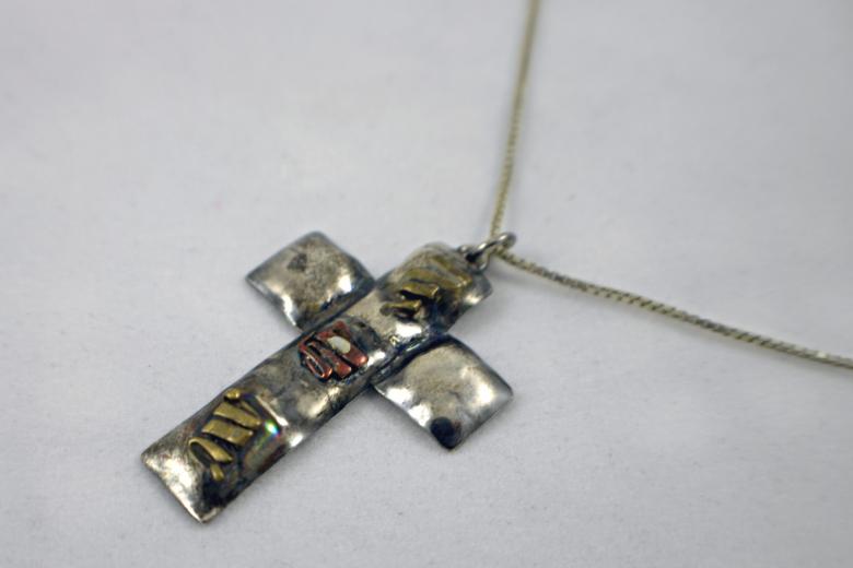 Free stock image of Cross necklace created by Bjorgvin