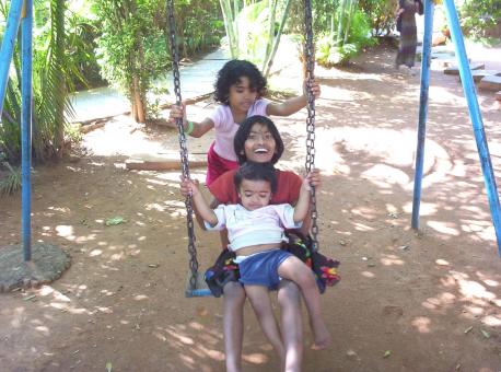 Fun in the swing - Free Stock Photo