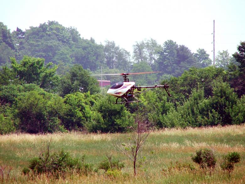 Free stock image of rc helicopter in flight created by Heather Elaine Kitchen