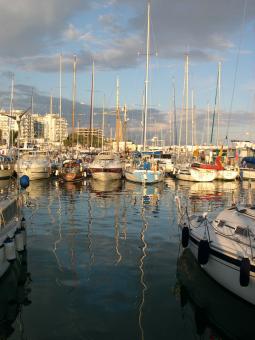 Free Stock Photo of Boats reflected in the water