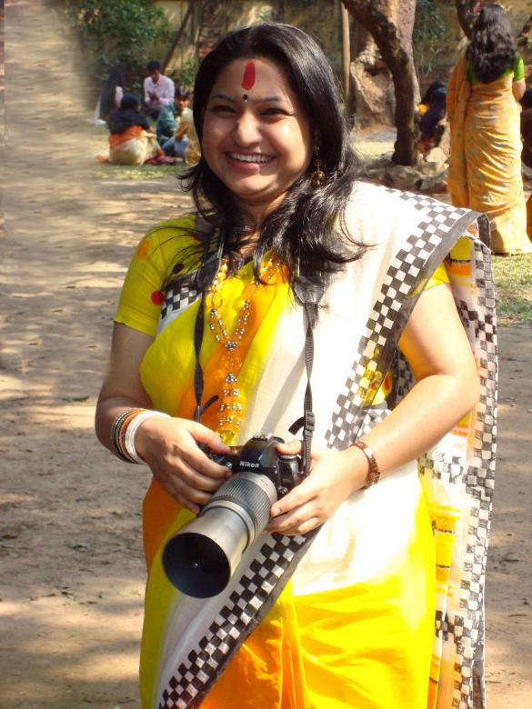 Free stock image of Lady Photographer created by Suvro Khan