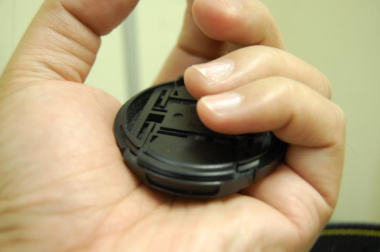 Free stock image of Lens cap in hand created by RuelCastillo
