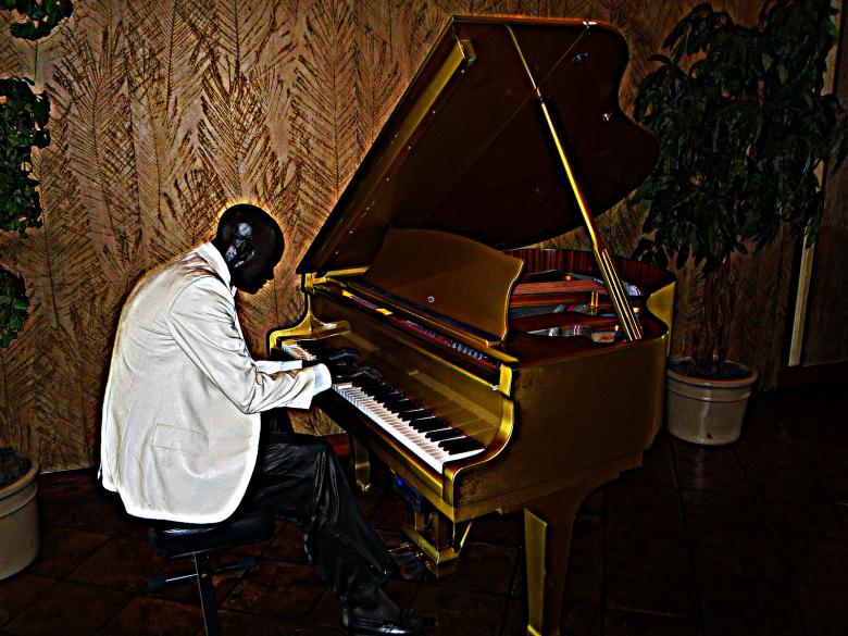 Free stock image of Piano man created by Doug Powell