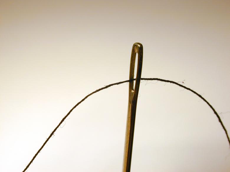 Free stock image of Needle and thread created by freeimageslive