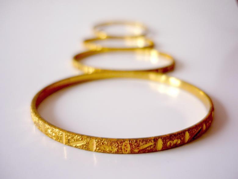 Free stock image of Gold Bangles created by Bilal Aslam
