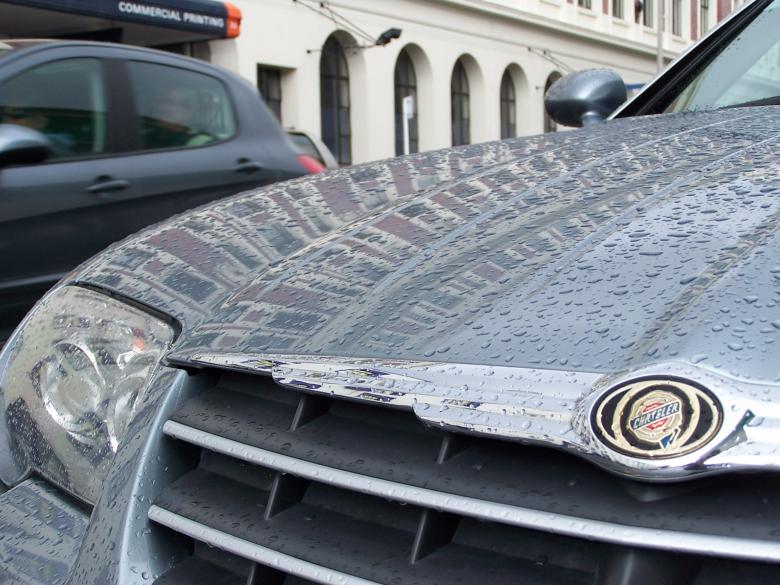 Free stock image of Rained Drenched Chrysler created by Peter Alexander Robb
