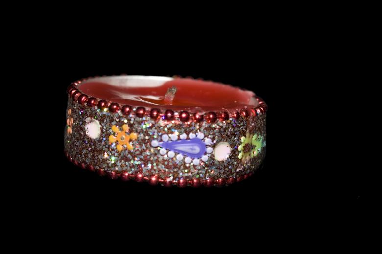 Free stock image of Ornate red Diya Candle created by Sundeep Goel