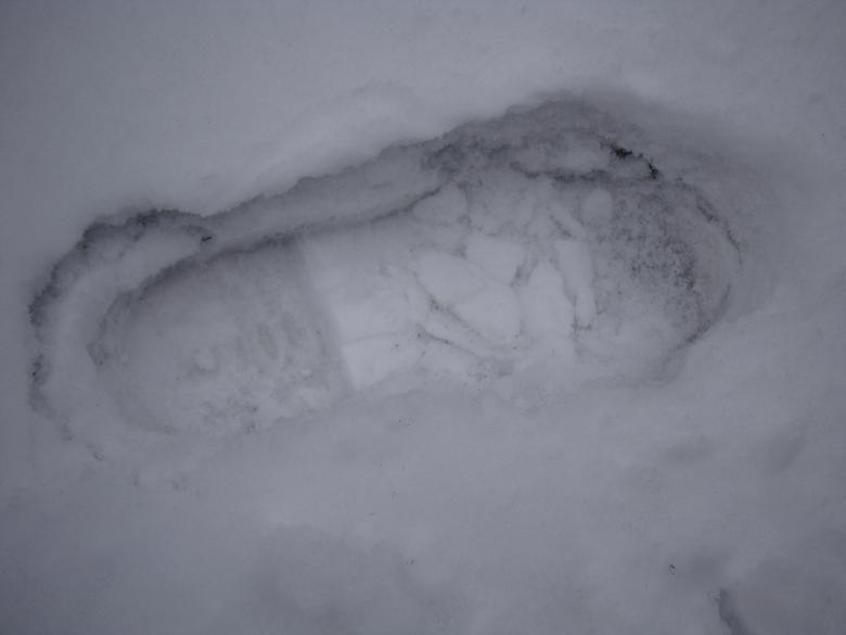 Free stock image of Footprint in the snow created by Nathan Bierma