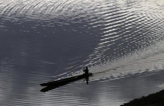 Paddling on the Mekong - Free Stock Photo