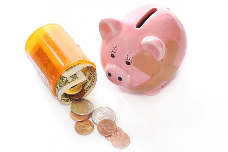 Free stock image of Piggy bank with pill bottle created by Val Lawless