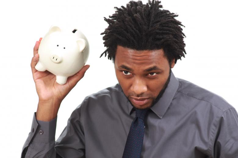 Free stock image of Man with a piggy bank created by Val Lawless