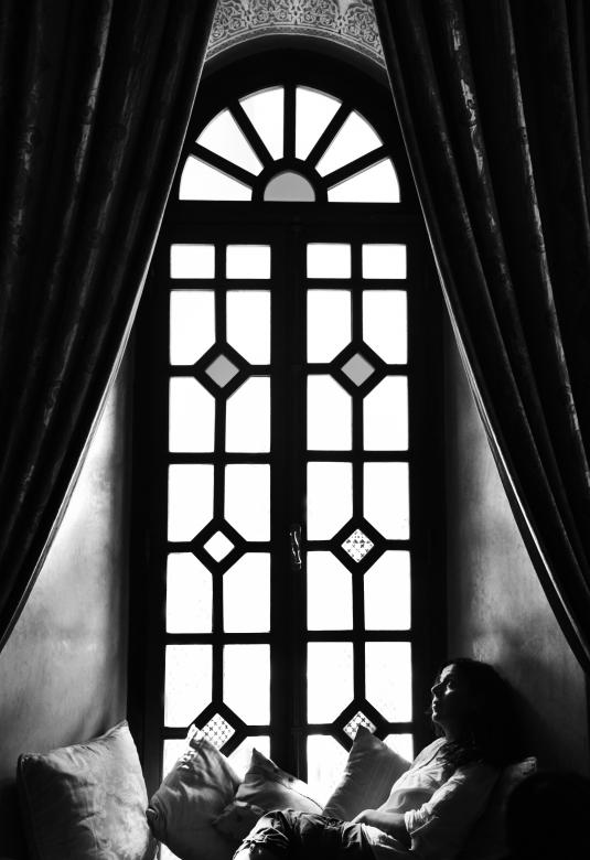 Free stock image of Woman sitting in window sill created by Luka