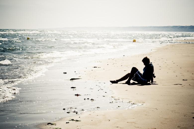 Free stock image of Girl sitting on the beach created by Luka