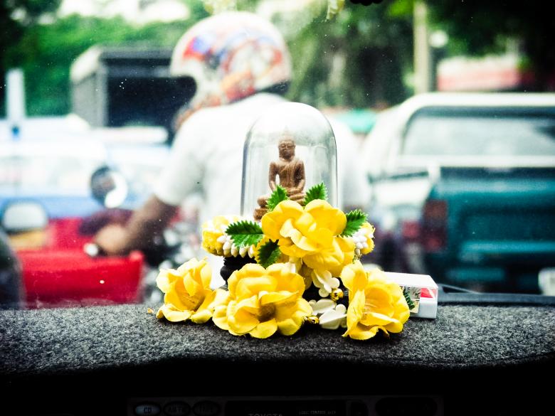 Free stock image of buddhist symbol in car Thailand created by Luka