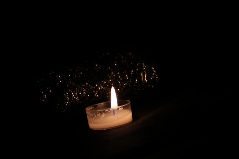 Free stock image of Candle illuminated the darkness created by basem