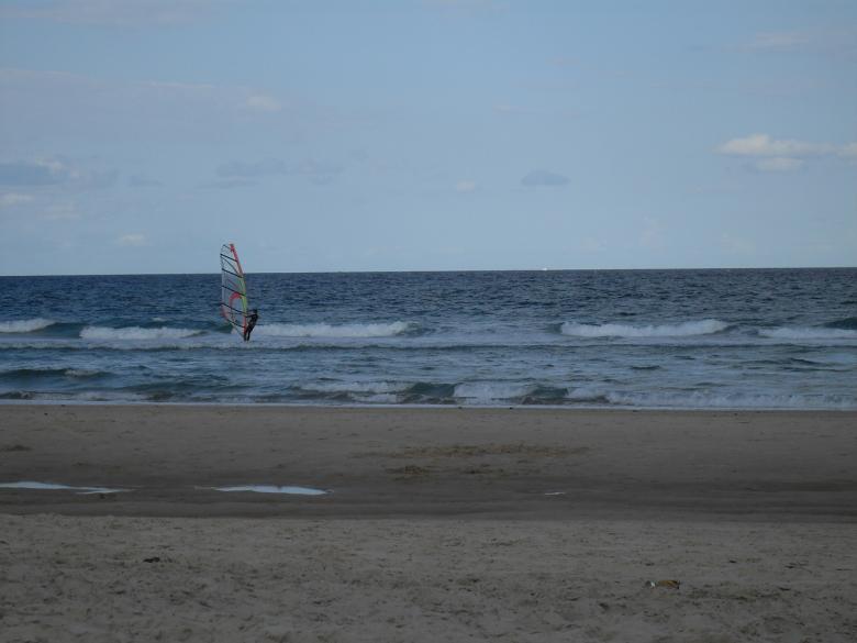 Free stock image of Windsurfer on beach created by Nicholas Spaggiari