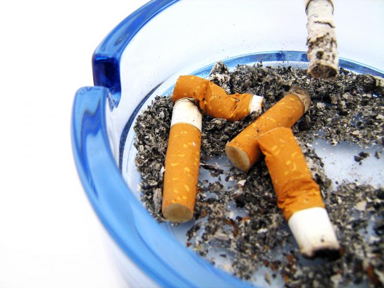 Free stock image of cigarettes in blue ashtray created by 2happy