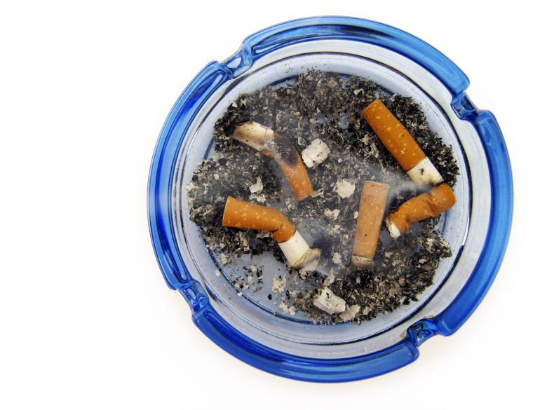 Free stock image of cigarettes in blue ashtray created by 2happy