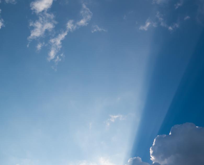 Free stock image of Sun behind clouds created by Janis Urtans
