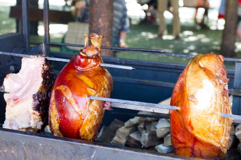 Free stock image of Pork roasting over fire created by Geoffrey Whiteway