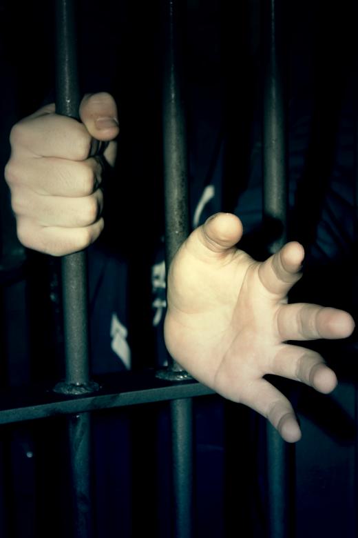 Free stock image of Hands from prison created by Val Lawless