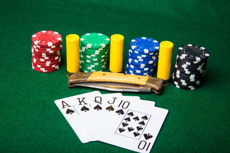 Free stock image of Royal Flush with bullets and knife created by Jared Davidson