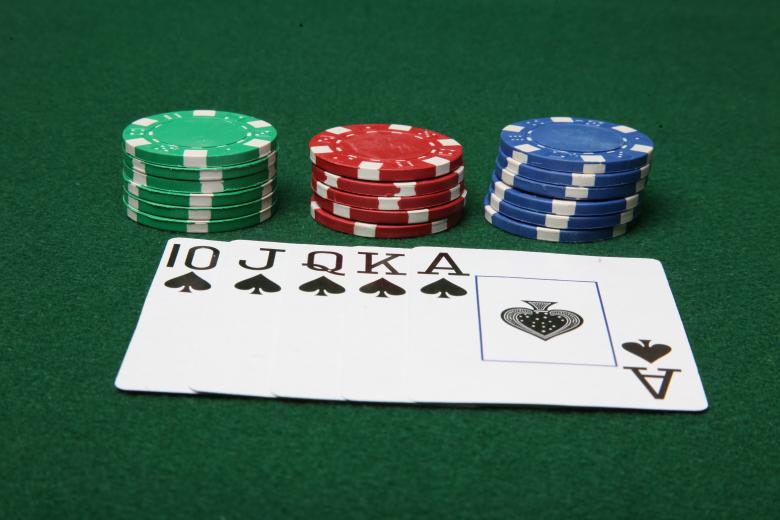 Free stock image of Royal Flush with poker chips created by Jared Davidson