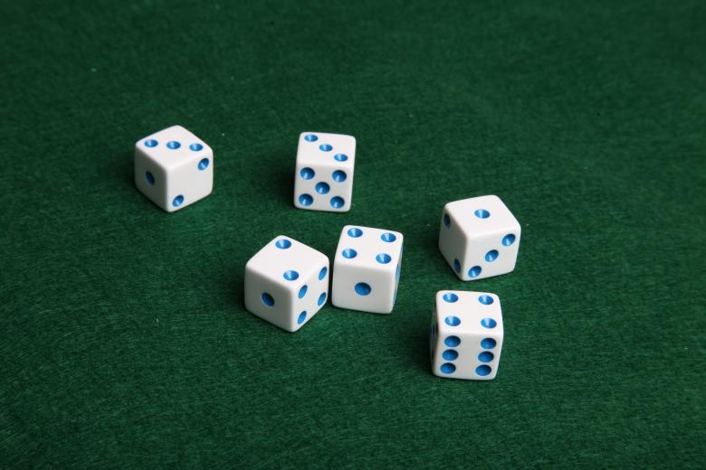 Free stock image of Dice on green felt table created by Jared Davidson