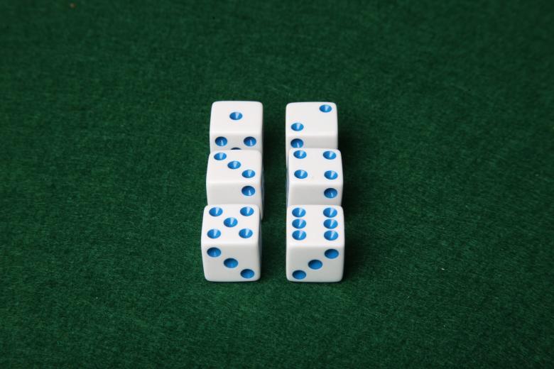 Free stock image of Dice on green felt table created by Jared Davidson