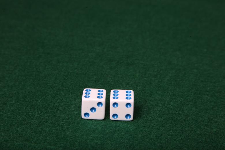 Free stock image of Dice on green felt table created by Jared Davidson
