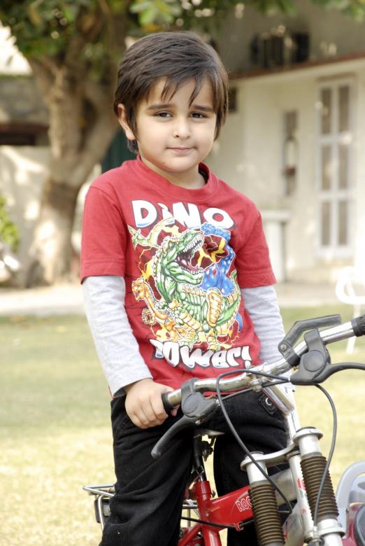 Free stock image of Cute Child with Bicycle created by Bilal Aslam