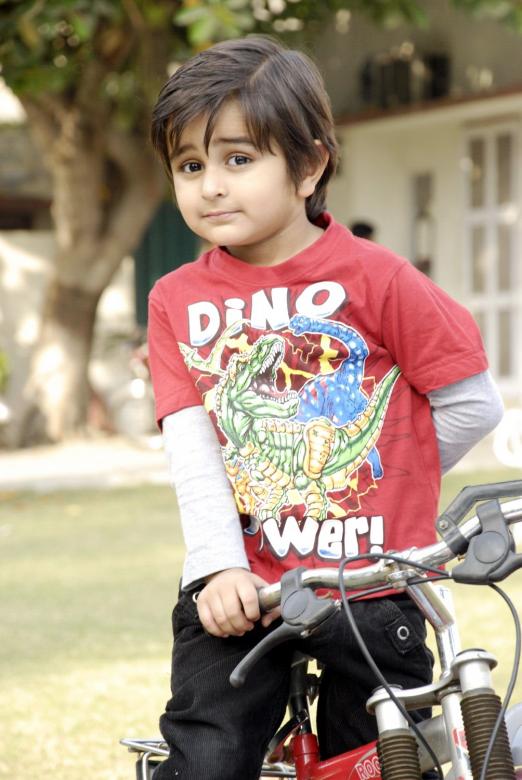 Free stock image of Cute Kid with Bicycle created by Bilal Aslam
